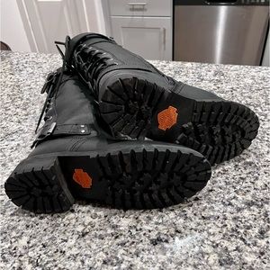 Women’s size 8 Harley Davidson black leather boots. Barely worn. Knee high.